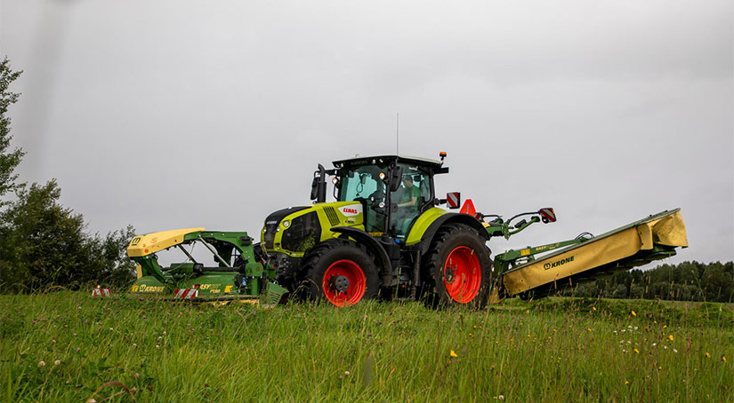 Krone niittokone sekä Claas traktori