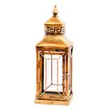 Messingin värinen metallilyhty