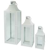 Metallinen lyhty kukka-kohokuviolla