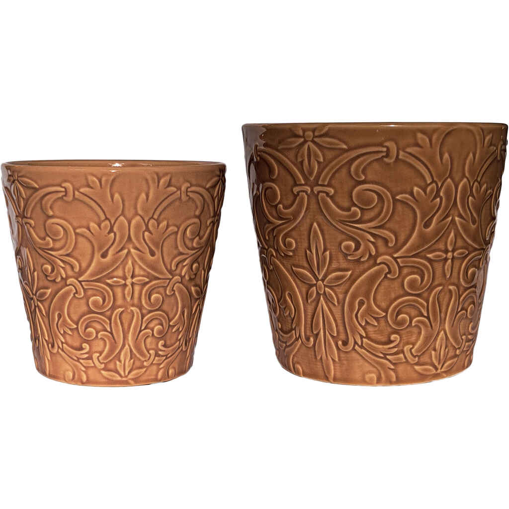 Kaunis persikanvärinen suojaruukku